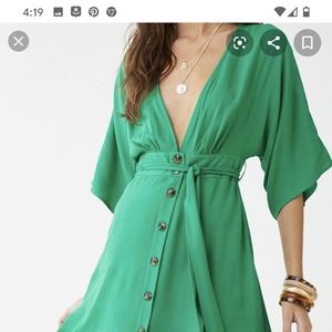 Green plunging button front dress
